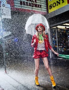 beautiful-girl-with-a-wet-umbrella-in-the-rain-2